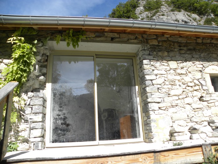 Baumugnes (05) Pose des pierre en chaîne d'angle